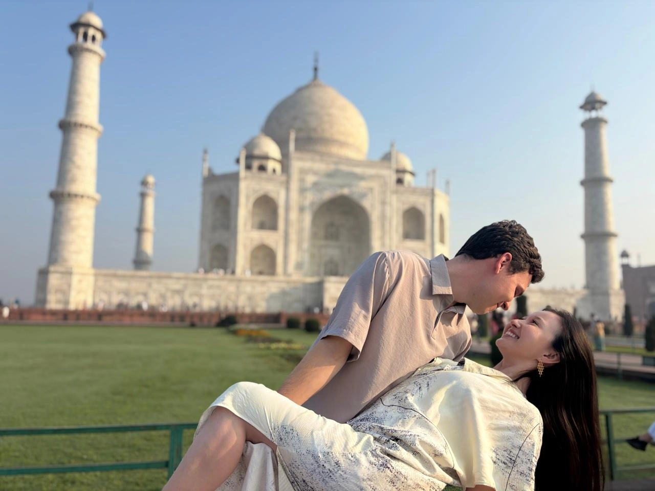 Taj Mahal glowing at sunset, seen on a private Agra tour